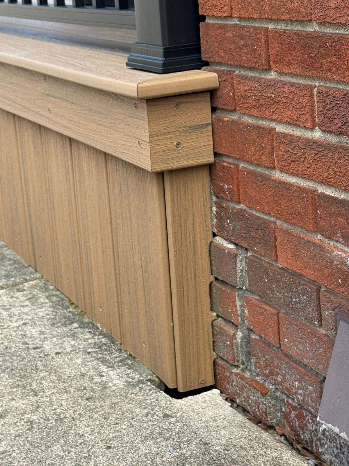 Close-up detail of composite deck corner post and trim