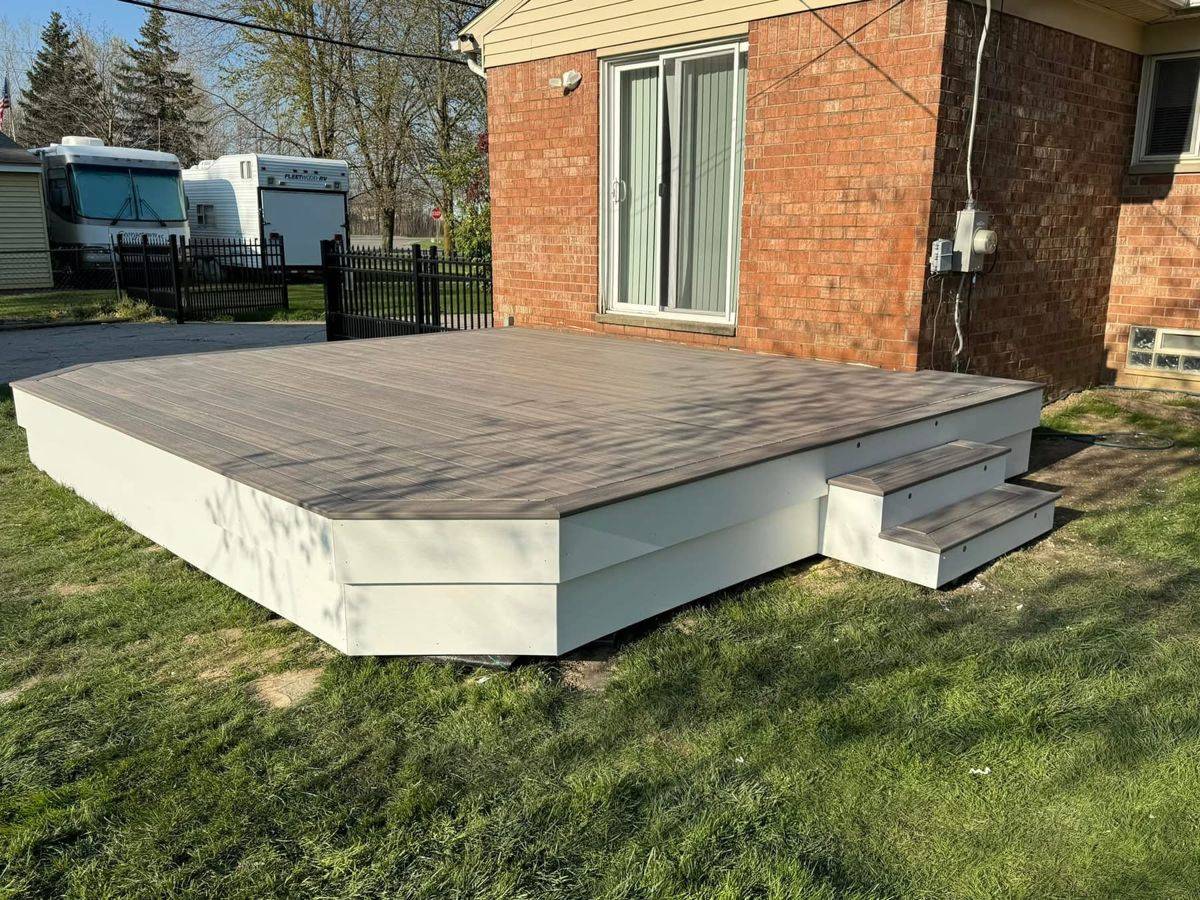Elevated white composite deck with steps